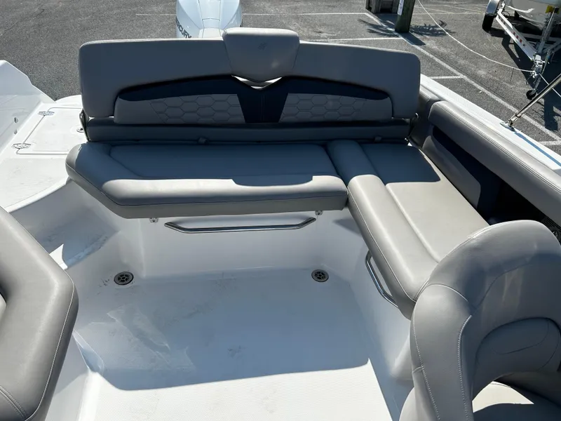 Slide: The Image of 2023 Four Winns HD3 OB boat interior with gray seating and modern design. - 10