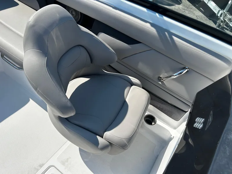 Slide: The Image of 2023 Four Winns HD3 OB boat interior with gray seating and modern design. - 9