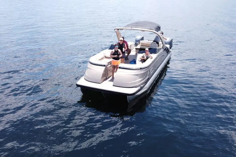 Slide: The Image of 2021 Bennington 27 QXSBWA X2 boat interior with beige seating and sleek design. - 18