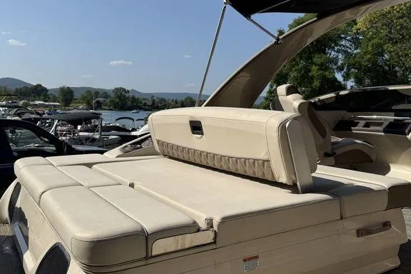 Slide: The Image of 2021 Bennington 27 QXSBWA X2 pontoon boat on trailer under blue sky. - 29