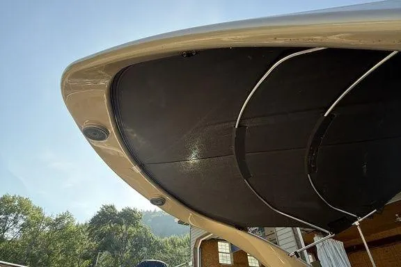 Slide: The Image of 2021 Bennington 27 QXSBWA X2 pontoon boat with passengers on a calm lake. - 46