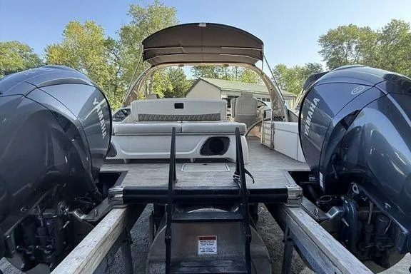 Slide: The Image of 2021 Bennington 27 QXSBWA X2 boat interior with sleek seating and elegant design. - 49