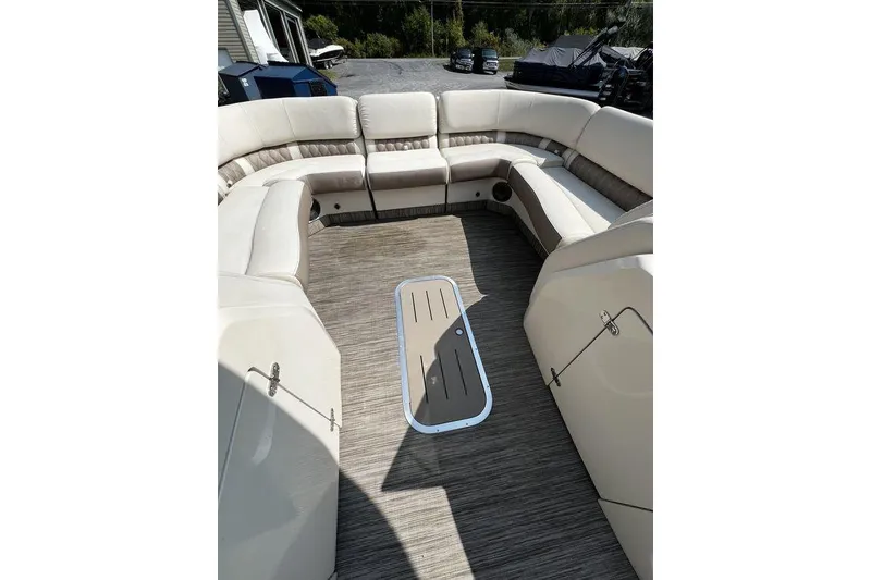 Slide: The Image of 2021 Bennington 27 QXSBWA X2 pontoon boat interior with spacious seating and modern design. - 58