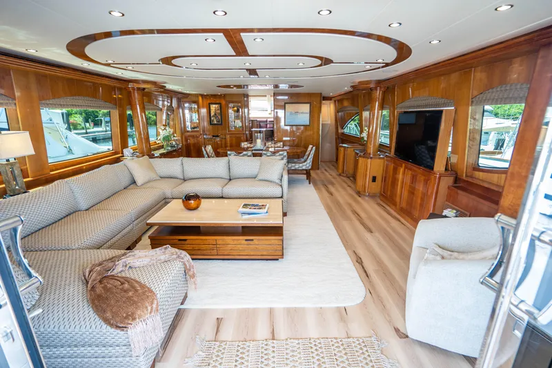 Slide: The Image of Luxurious interior of a 2008 Hatteras 80 Motor Yacht with elegant wood finishes. - 3