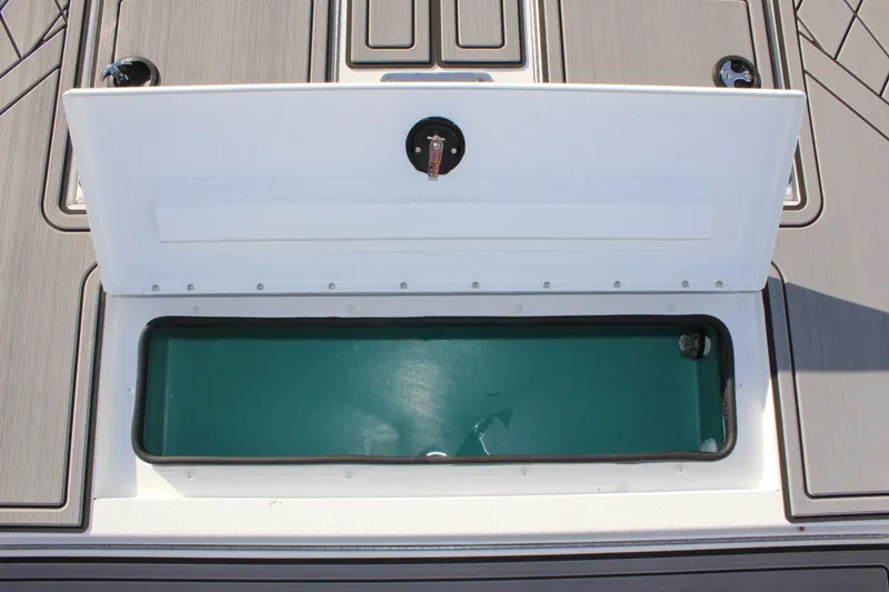 Slide: The Image of 2026 Avid 20 Rogue CC boat interior with console and seating. - 23