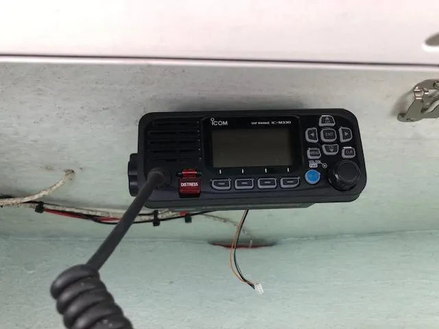 Slide: The Image of ICOM marine radio installed on 2022 Robalo R242 Center Console boat. - 23