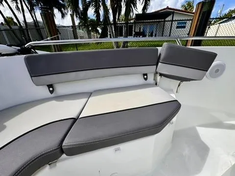 Slide: The Image of 2023 Jeanneau Leader 7.5 CC Series 3 boat seating area with gray cushions. - 29