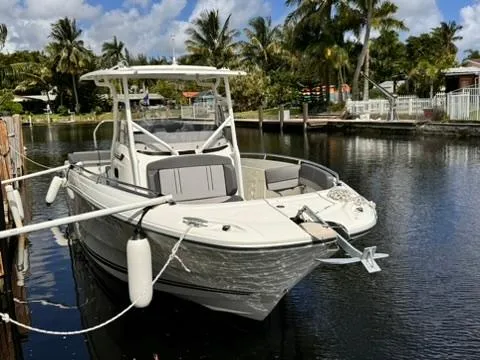 Slide: The Image of 2023 Jeanneau Leader 7.5 CC Series 3 boat docked on a sunny day. - 3