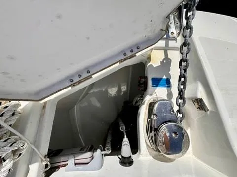 Slide: The Image of Anchor compartment of 2023 Jeanneau Leader 7.5 CC Series 3 boat with chain and winch. - 30