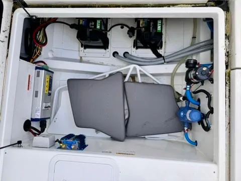 Slide: The Image of 2023 Jeanneau Leader 7.5 CC Series 3 engine compartment with wiring and equipment. - 33