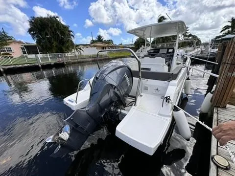 Slide: The Image of 2023 Jeanneau Leader 7.5 CC Series 3 boat docked on a sunny day. - 8