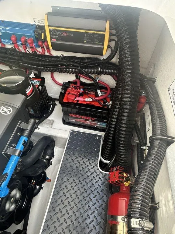 Slide: The Image of Engine compartment of 2025 Formula 290 Bowrider with battery and wiring. - 26