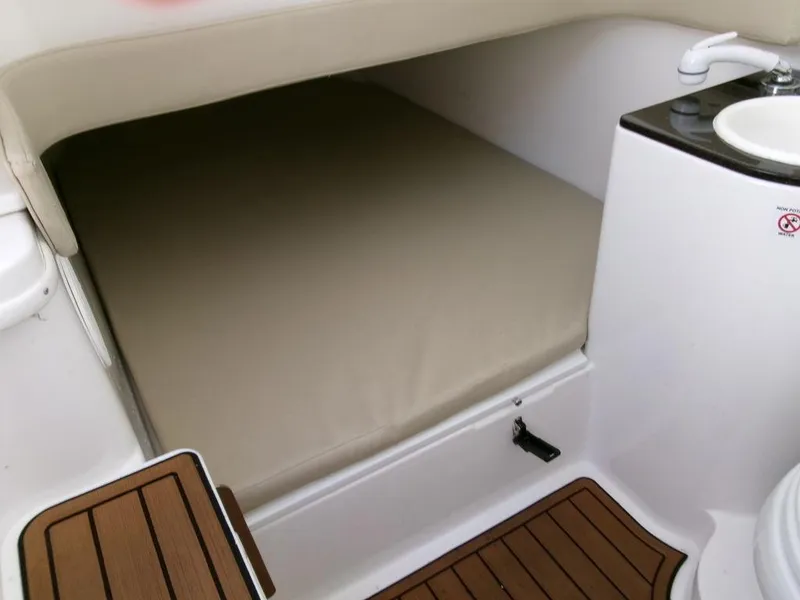 Slide: The Image of 2018 Sea Fox 328 Commander cabin interior with bed and sink. - 16
