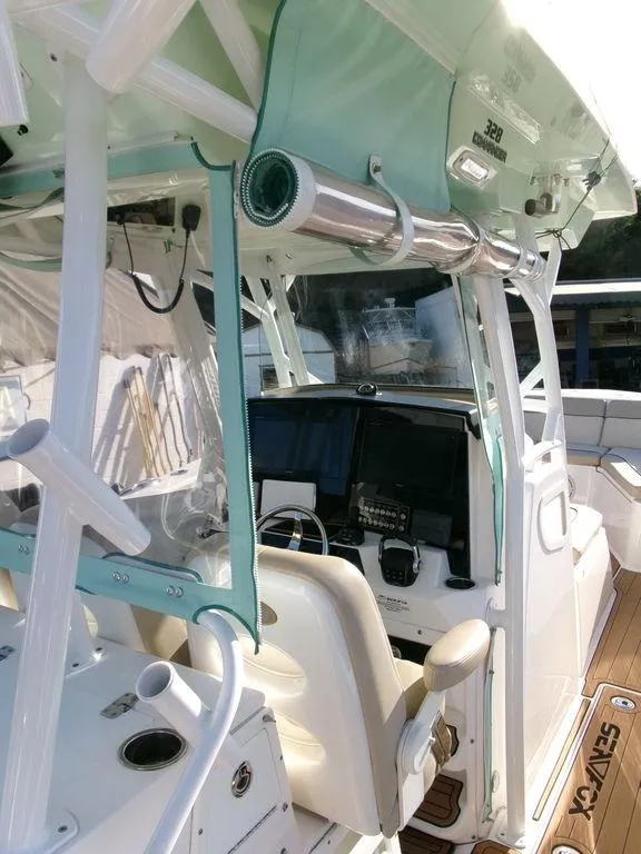 Slide: The Image of 2018 Sea Fox 328 Commander boat interior with navigation equipment and seating. - 19