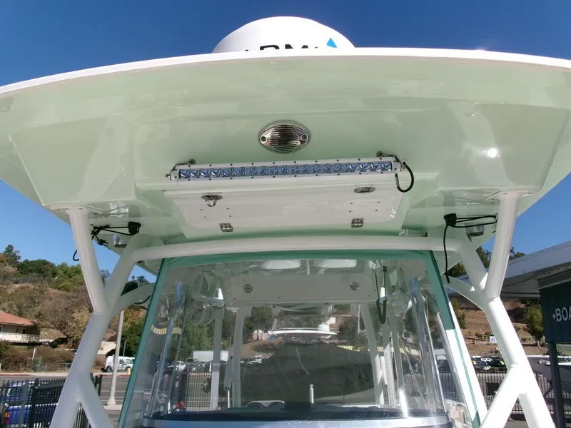 Slide: The Image of 2018 Sea Fox 328 Commander boat with advanced navigation equipment and sleek design. - 25