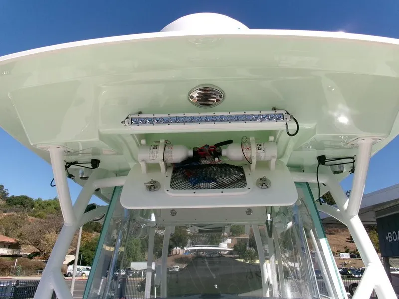 Slide: The Image of 2018 Sea Fox 328 Commander boat console with overhead storage and lighting. - 26