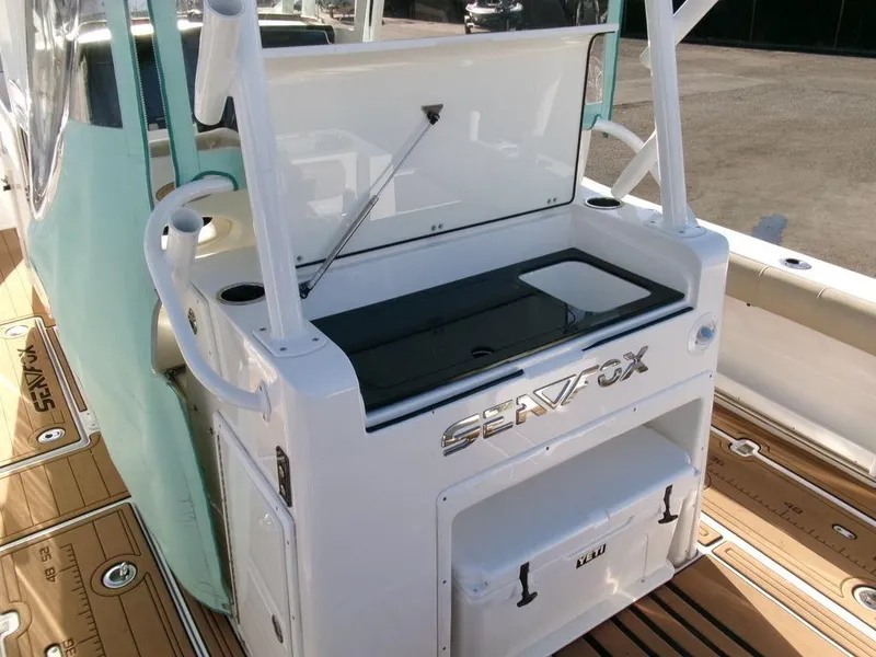 Slide: The Image of 2018 Sea Fox 328 Commander boat interior with fishing station and storage. - 30