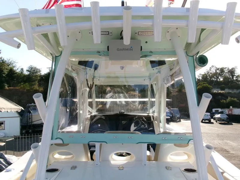 Slide: The Image of 2018 Sea Fox 328 Commander boat with Garmin equipment, docked outdoors. - 31