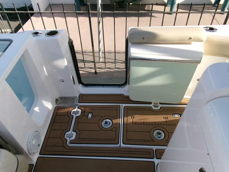 Slide: The Image of 2018 Sea Fox 328 Commander boat deck with seating and storage. - 33