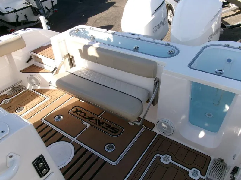 Slide: The Image of 2018 Sea Fox 328 Commander boat interior with seating and deck features. - 35