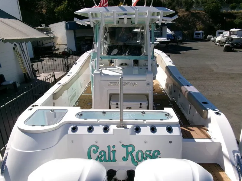 Slide: The Image of 2018 Sea Fox 328 Commander boat named "Cali Rose" docked in a marina. - 43