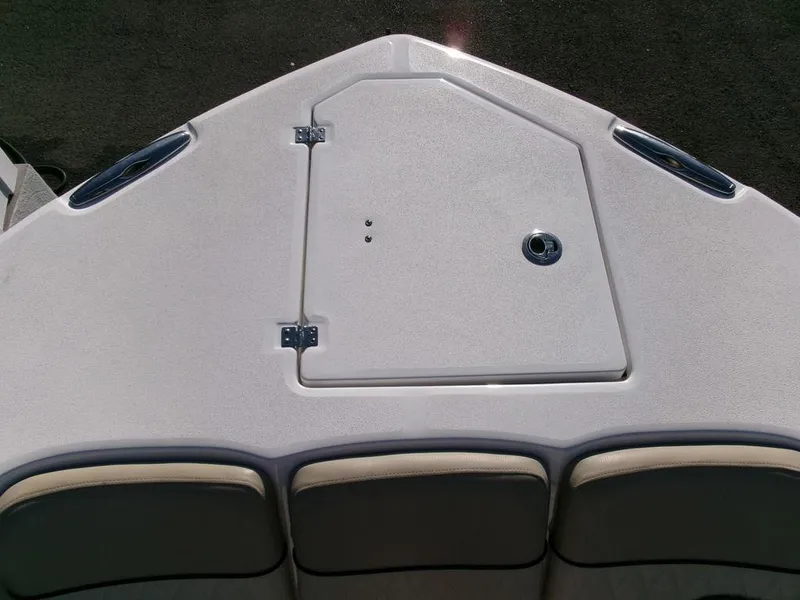 Slide: The Image of 2018 Sea Fox 328 Commander boat deck with storage hatch and seating. - 5