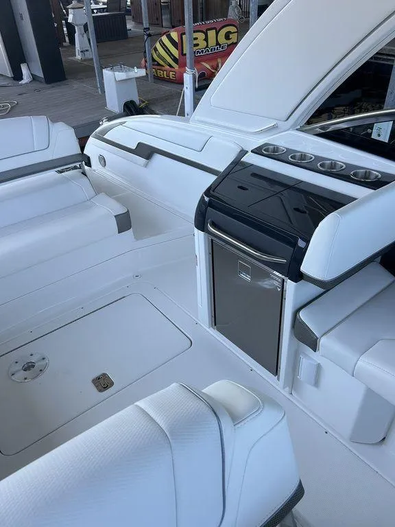 Slide: The Image of 2025 Formula 310 Bowrider interior with sleek seating and modern amenities. - 24