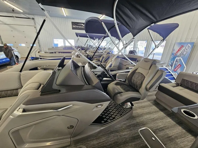 Slide: The Image of 2025 Bennington 23 RSB pontoon boat interior with luxurious seating and modern design. - 12