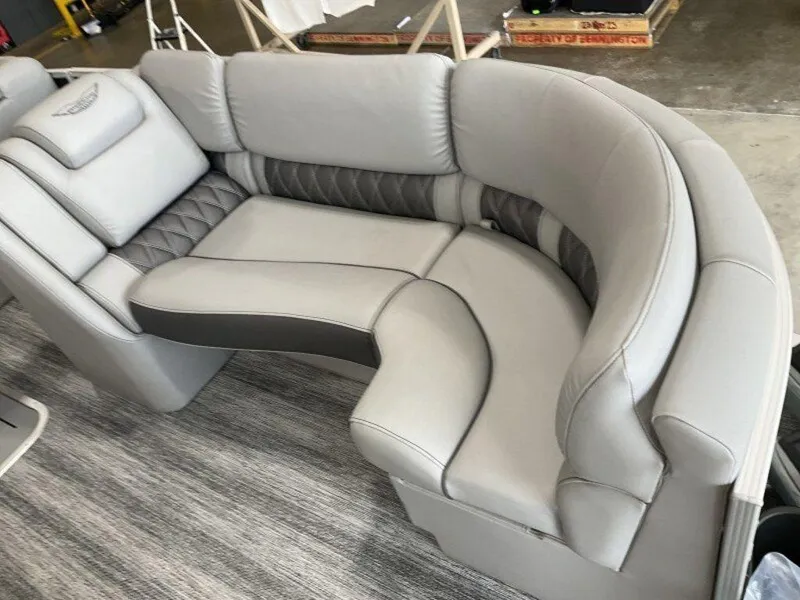 Slide: The Image of 2025 Bennington 23 RSB boat interior with luxurious gray seating. - 14
