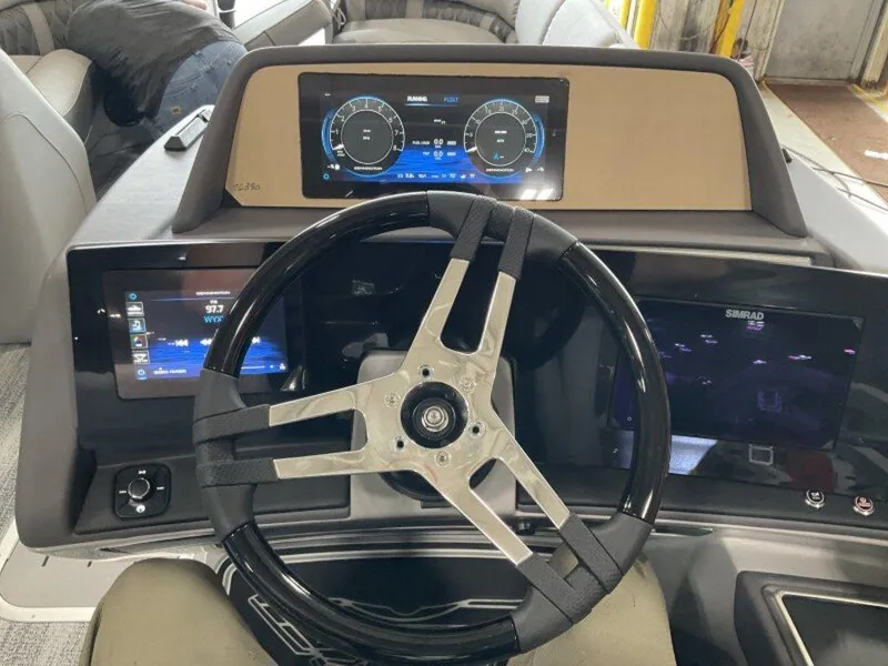 Slide: The Image of 2025 Bennington 23 RSB dashboard with modern steering wheel and digital displays. - 5