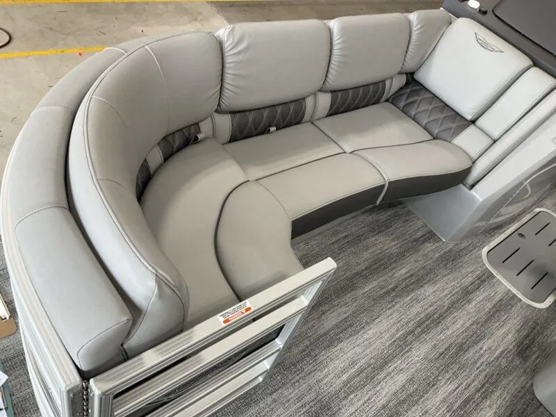 Slide: The Image of 2025 Bennington 23 RSB boat interior with luxurious gray seating and modern design. - 8