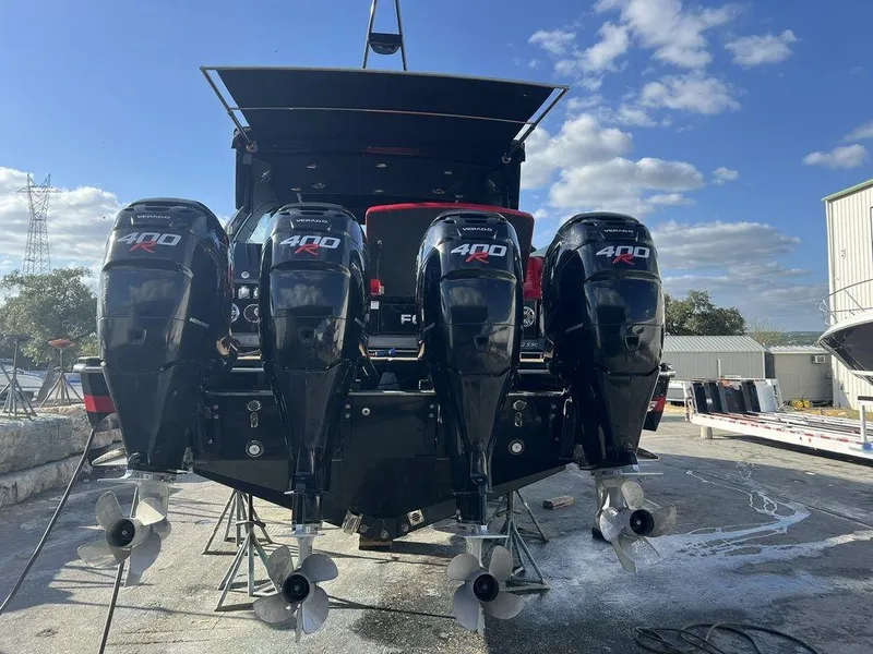 Slide: The Image of 2022 Formula 400 Super Sport Crossover with four powerful outboard engines. - 22