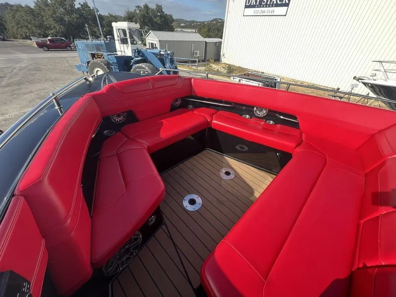 Slide: The Image of 2022 Formula 400 Super Sport Crossover with vibrant red seating and spacious deck. - 24