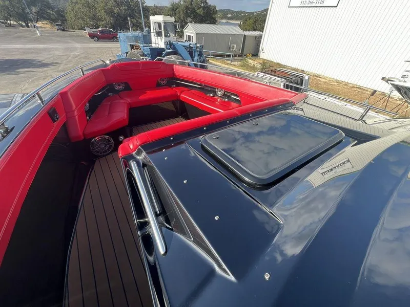 Slide: The Image of 2022 Formula 400 Super Sport Crossover with red seating and sleek design. - 25