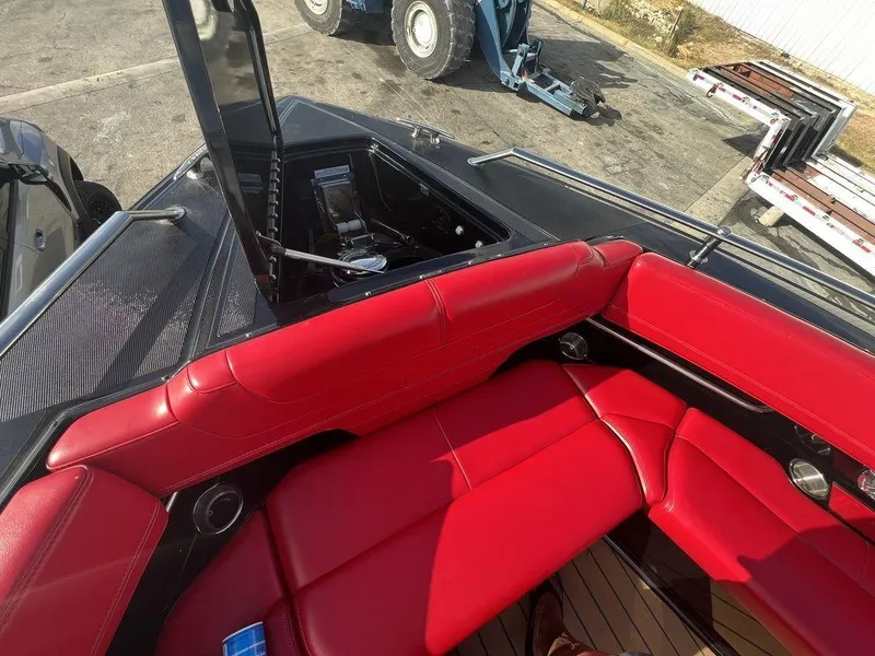 Slide: The Image of 2022 Formula 400 Super Sport Crossover with vibrant red seating and sleek design. - 28