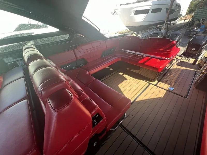 Slide: The Image of 2022 Formula 400 Super Sport Crossover with luxurious red seating and spacious deck. - 35