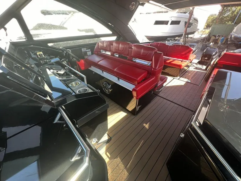 Slide: The Image of 2022 Formula 400 Super Sport Crossover interior with red seating and sleek design. - 37