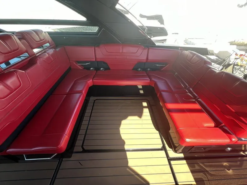 Slide: The Image of 2022 Formula 400 Super Sport Crossover with luxurious red seating and sleek interior design. - 38
