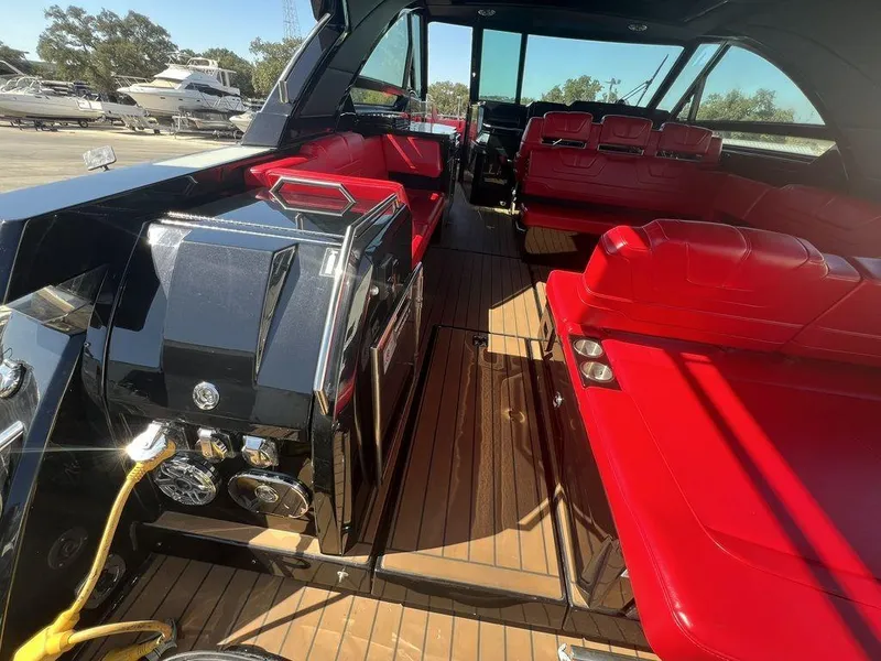 Slide: The Image of 2022 Formula 400 Super Sport Crossover interior with red seating and sleek design. - 39