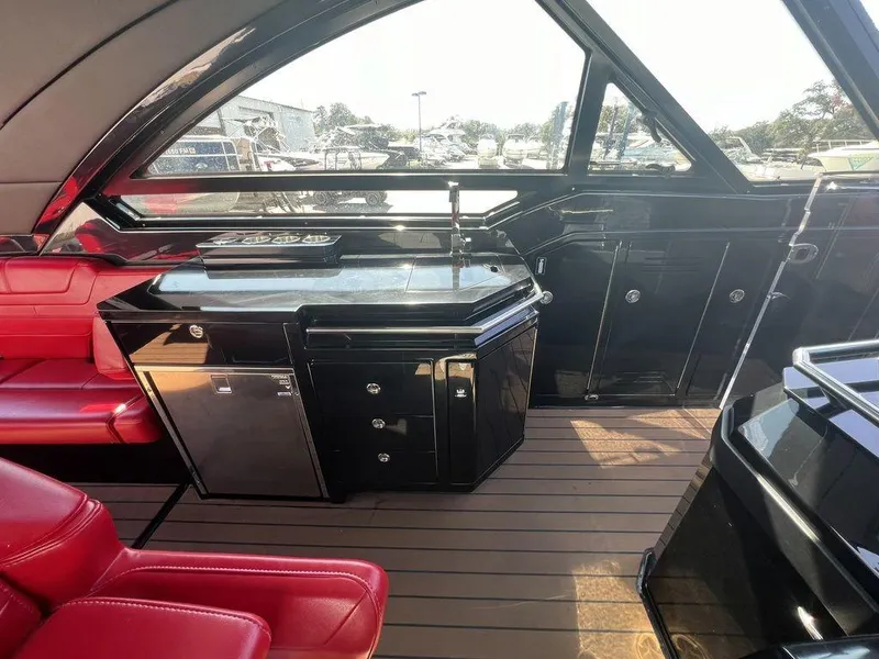 Slide: The Image of 2022 Formula 400 Super Sport Crossover interior with sleek design and red seating. - 44