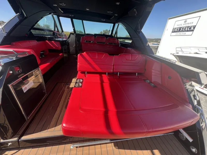 Slide: The Image of 2022 Formula 400 Super Sport Crossover with luxurious red interior and spacious seating. - 45