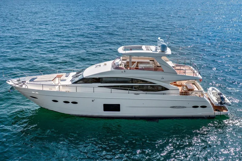The Image of 2015 Princess 72 Motor Yacht cruising on open sea under clear skies. - 0
