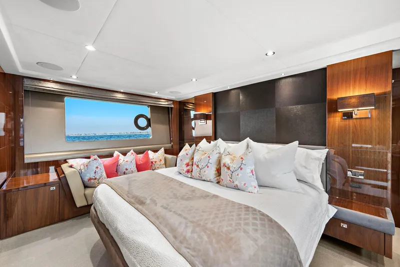 Slide: The Image of Luxurious 2015 Princess 72 Motor Yacht deck with seating, ocean view, and American flag. - 14