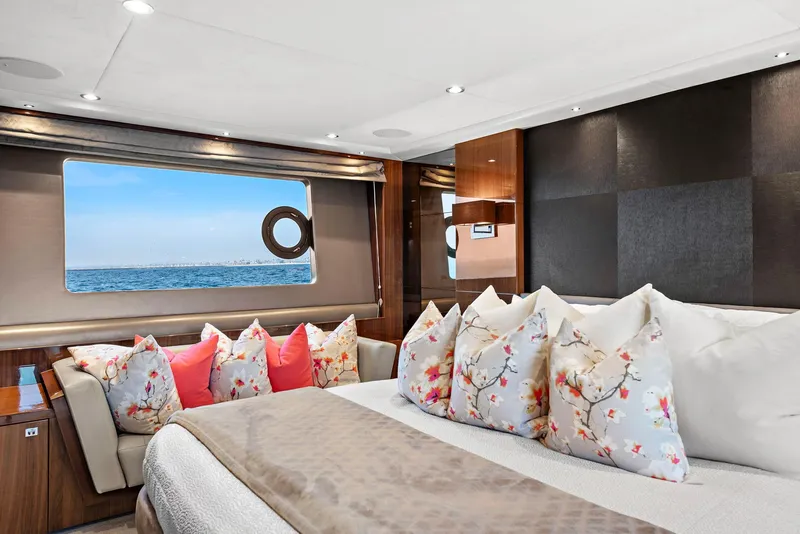 Slide: The Image of Luxurious 2015 Princess 72 Motor Yacht deck with seating, table, and ocean view. - 15