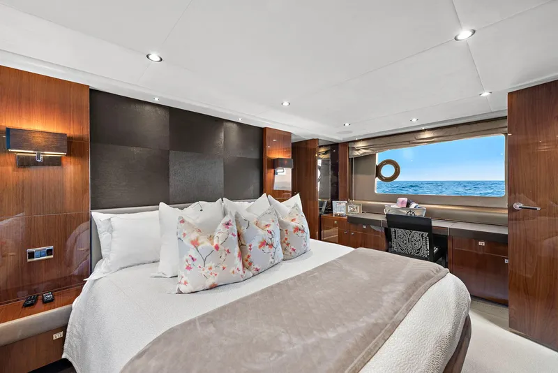 Slide: The Image of Luxurious interior of 2015 Princess 72 Motor Yacht with ocean view and elegant seating. - 19