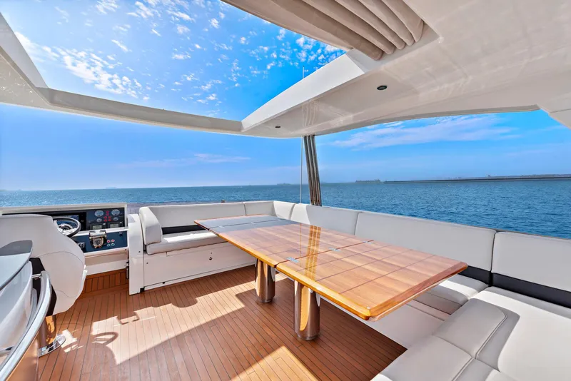 Slide: The Image of Interior of 2015 Princess 72 Motor Yacht, featuring hallway with equipment and safety door. - 35