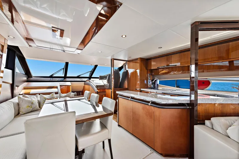 Slide: The Image of Interior helm of 2015 Princess 72 Motor Yacht with leather seats and modern controls. - 4