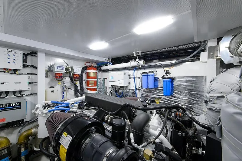 Slide: The Image of 2015 Princess 72 Motor Yacht cruising on open water, showcasing elegant design and spacious decks. - 45