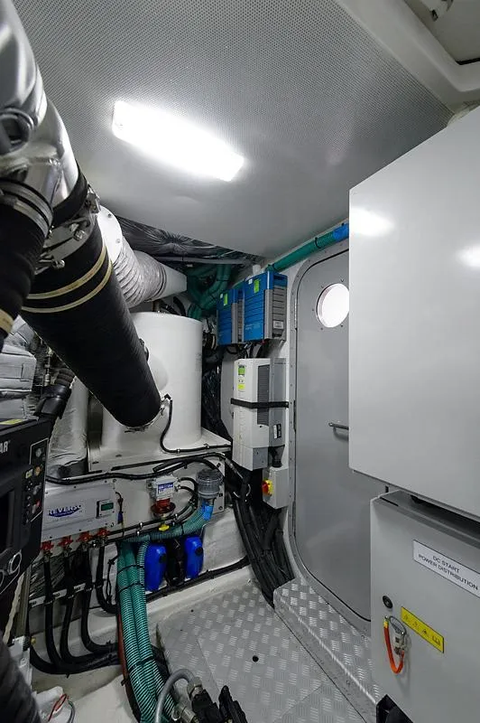 Slide: The Image of 2015 Princess 72 Motor Yacht cruising on open sea, showcasing luxury design and spacious deck. - 47