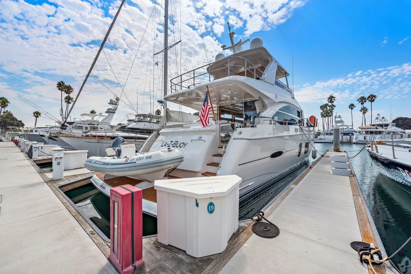 Slide: The Image of Luxurious 2015 Princess 72 Motor Yacht cruising on sparkling blue waters. - 48